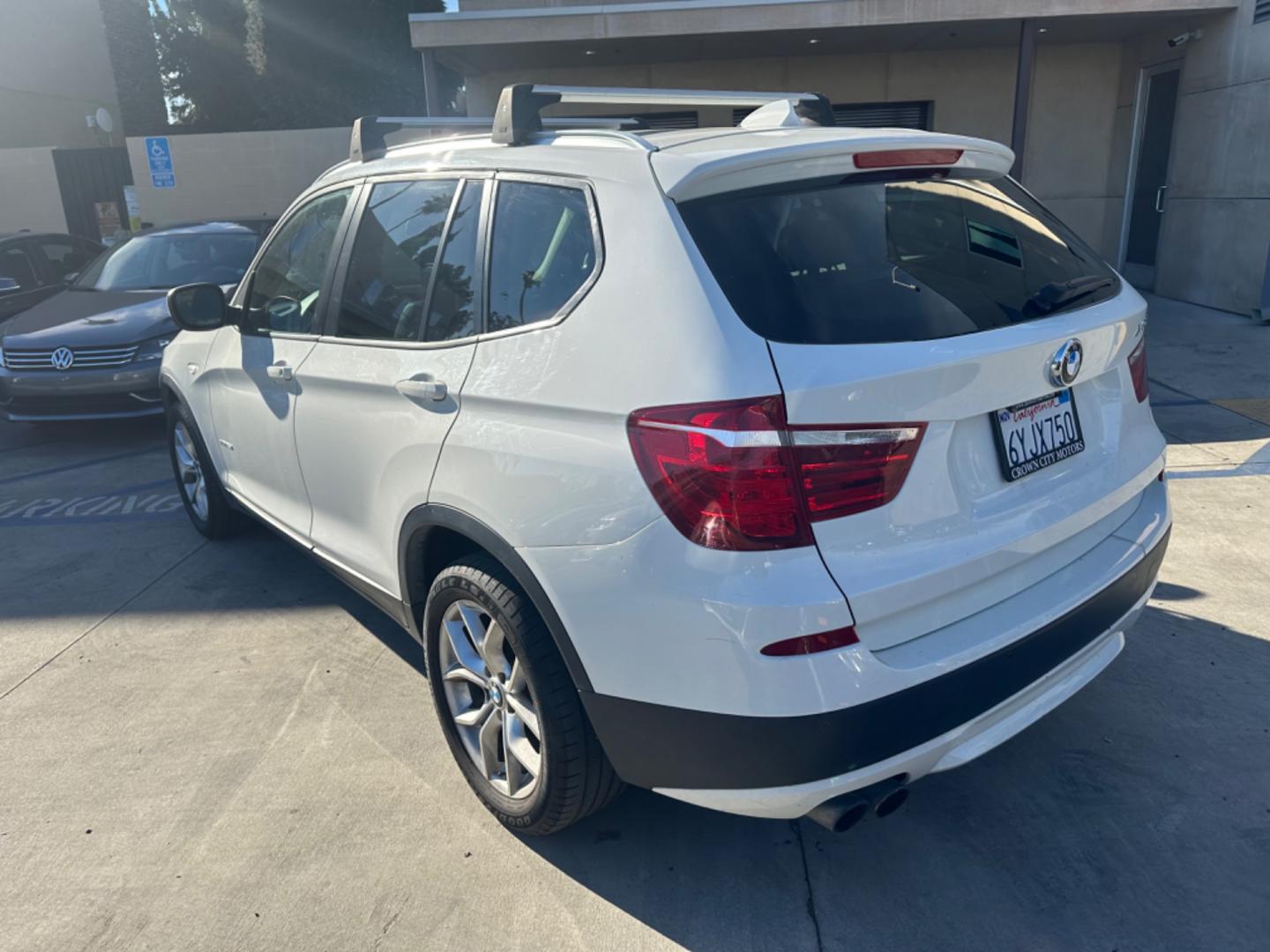 2013 WHITE BMW X3 xDrive28i (5UXWX9C52D0) with an 3.0L L6 DOHC 24V engine, 8-Speed Automatic transmission, located at 30 S. Berkeley Avenue, Pasadena, CA, 91107, (626) 248-7567, 34.145447, -118.109398 - Crown City Motors is a used “Buy Here Pay Here” car dealer in Pasadena CA. “Buy Here Pay Here” financing, means that when you purchase your vehicle from our dealership, that you make the payments to the dealership as well. We do not need the banks approval to get you approved for a used auto - Photo#2